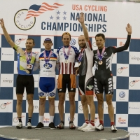 Bobby Lea on top of the points race podium